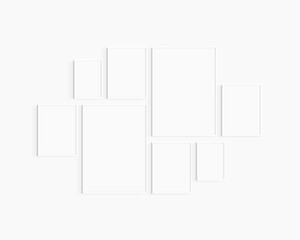 Gallery wall mockup. Set of 8 white frames. Gallery wall frame mockup. Two 50x70 (5:7), four 30x40 (3:4), and two A4 (5:7) white frames.