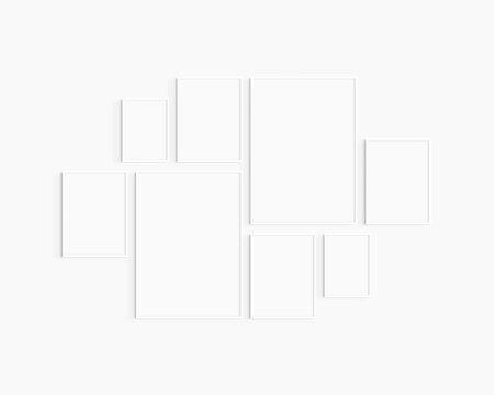 Gallery wall mockup. Set of 8 white frames. Gallery wall frame mockup. Two 50x70 (5:7), four 30x40 (3:4), and two A4 (5:7) white frames.