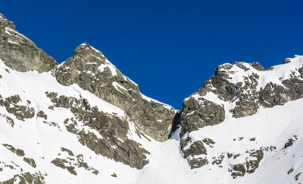 South wall of the Zabi Kon (Frog Horse) in winter scenery. The peak in the High Tatras is popular among mountaineers.