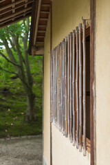 window with wooden bars