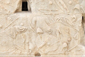 Trajan's Column Detail with Soldier Shields in Rome, Italy