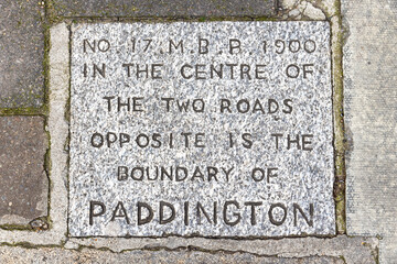 Old Boundary marker of Paddington borough, London. This stone  was set into the pavement in1900.