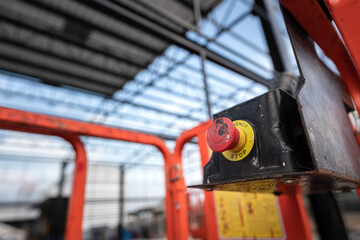 An emergency push button of the personnel lifting basket which is use for carrier employee high up...