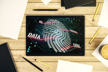 Modern digital tablet monitor with abstract creative fingerprint hologram, research and development concept. Top view. 3D Rendering