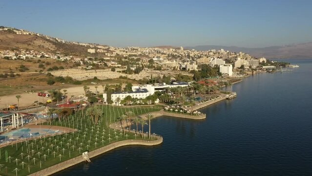 Drone flight past water theme park in Tiberias, located on the shores of the Sea of Galilee in Israel
