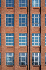 Facade from an tall old brick building 