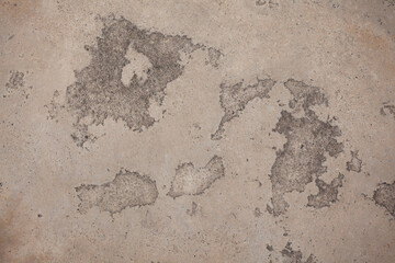 The cement wall background is getting old and dirty