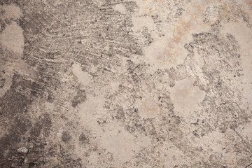 The cement wall background is getting old and dirty
