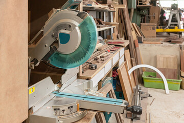 interior of wood workshop with chainsaw table is locked