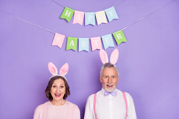 Photo of astonished excited people unbelievable reaction look camera isolated on violet color background