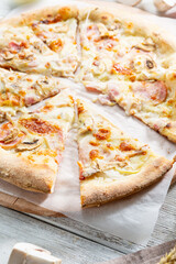 Close up of ham and cheese sliced on wood