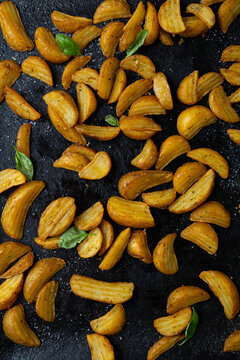 Golden Roasted Potatoes Wedges On Baking Tray Food Overhead View