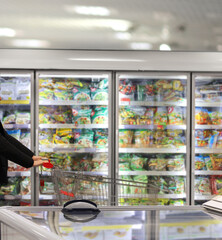 choosing a dairy products at supermarket