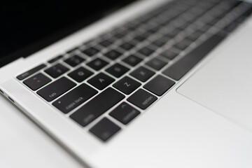 Blur laptop with shallow forcus on keyboard for background