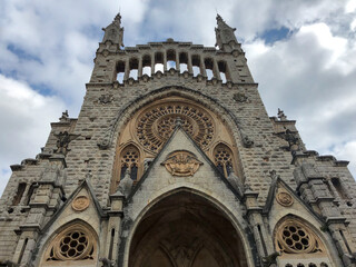 Fototapeta na wymiar Sant Bartomeu Church on the main square in Sóller designed by Antoni Gaudí's disciple, Joan Rubió Bellver