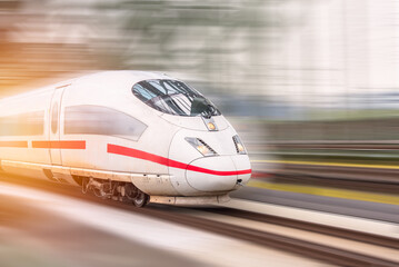 Obraz na płótnie Canvas Modern high speed passenger train. Motion blur effect.