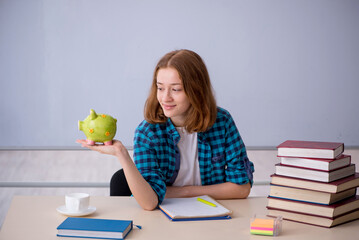 Young female student in expensive education concept