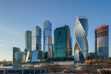 Skyscrapers in the business center, financial district, sunny day, blue sky, empty space, Moscow city, Russia.