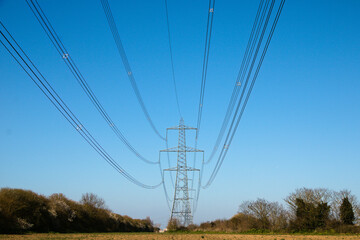 Power lines landscape of the field and electricity pylon