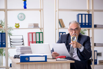 Old male employee and too much work in the office