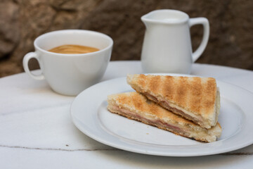 Toasted sandwich and coffee