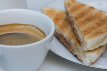 coffee and a toasted sandwich 