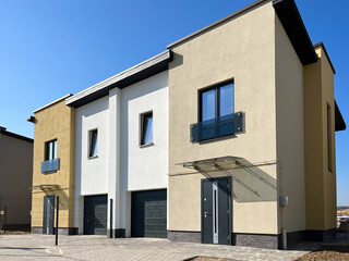 Exterior view of a modern townhouse. The concept of outdoor buildings of multi-apartment residential townhouses