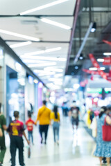 Blurred people walking in a shopping mall.