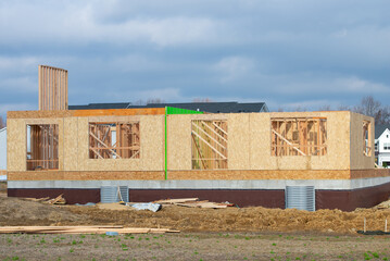 frame from the wall of a new plywood house development
