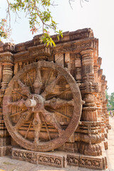 A stone wheel engraved in the walls of the 800 year old Sun Temple, Konark, India. The temple is...