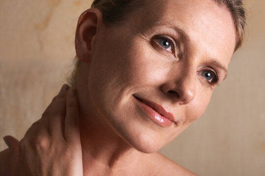 Relief From The Days Cares. Studio Shot Of A Mature Woman With Beautiful Skin.