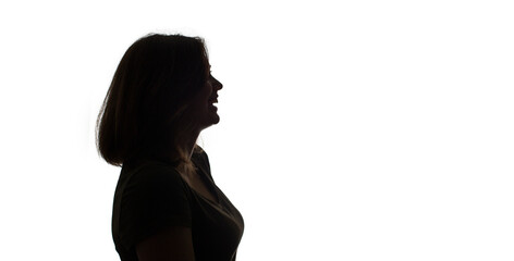 silhouette of a smiling girls profile isolated on white