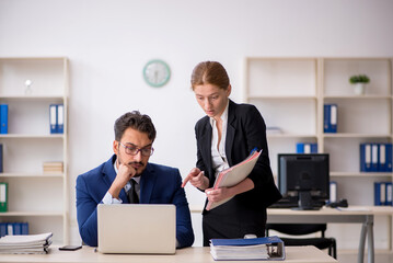 Two colleagues working in the office