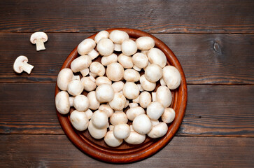 mushrooms for cooking on a cutting board, flat lay,