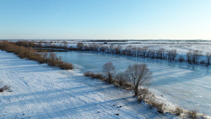 Aerial photo of the river on a spring evening in March