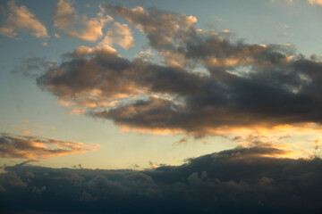 Lots of fluffy clouds in the blue sky