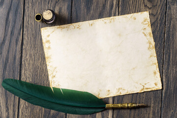 Mockup empty paper with feather quill pen