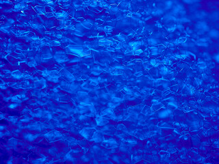Abstract blue soap bubbles background, extreme close up, macro photography