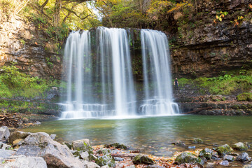 Sgwd-yr-Eira Waterfall in South Wales, UK