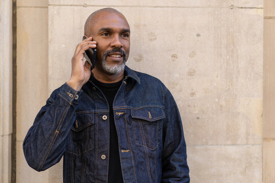 Mature Black Man In CityMature Black Man In City Talking On Cell Phone