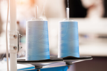 Sewing equipment, loom equipment at a garment factory, industrial concept background