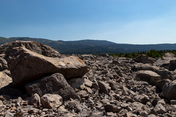 rocks laying where they fell from mountain top after landslide natural disaster in Alberta Canada