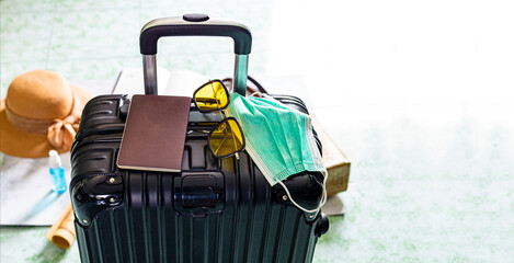 Luggage and travel,Suitcase, passport and medical mask,Flights canceled or delayed transportation business passenger COVID-19 crisis flight cancelled and coronavirus suffer from financial 