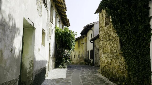 POV point of view shot of walking trough old beautiful town Tuscany like in Goriska Brda Slovenia