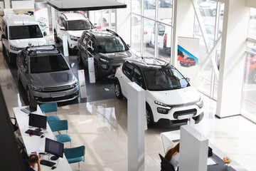 Newest modern cars at luxury dealership salon, view above