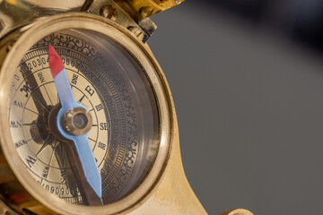 Detail of an antique maritime bronze solar compass