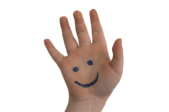 hand of a child with a painted smile on a white background - Powered by Adobe