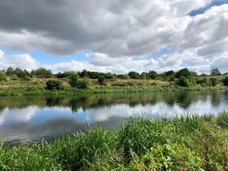 Landscape photo of lake and sky in summer
