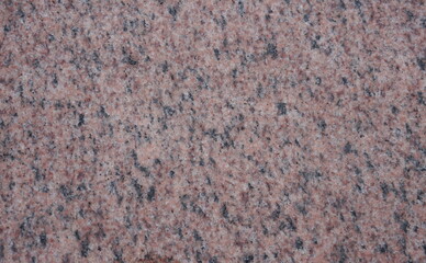 Rose, Black, White Speckled Granite as Background
