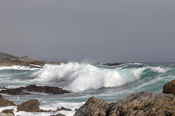 Sea waves and rocks on the beach